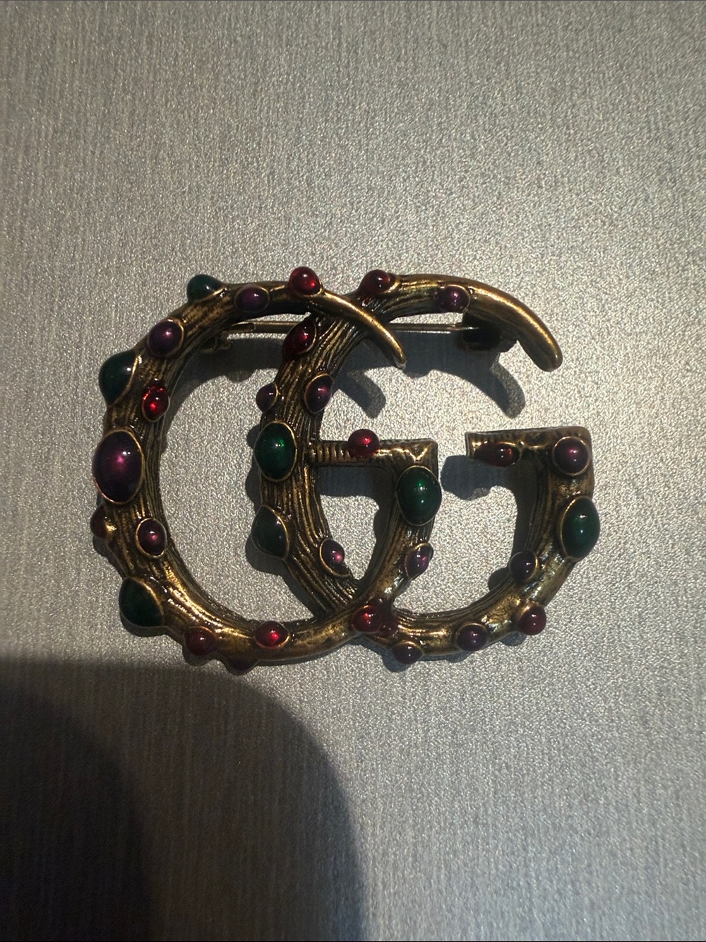 Inspired Gold-Tone Brooch with Green and Purple Cabochons